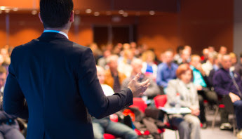 Speaker at Business Conference and Presentation. Audience at the conference hall.